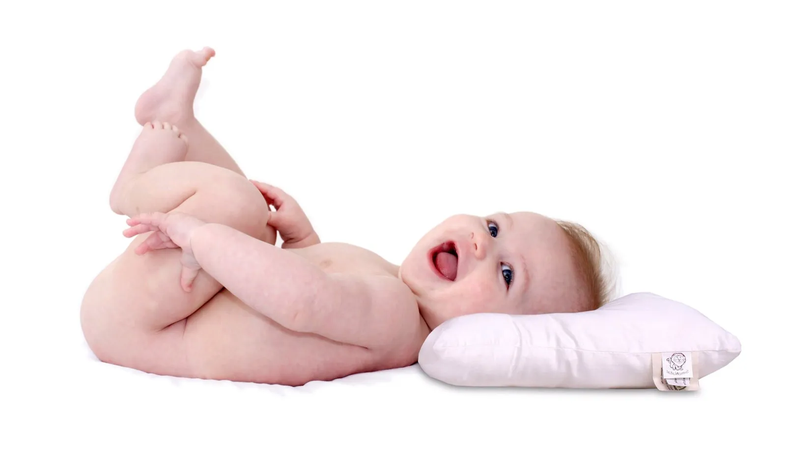 Neonato sdraiato con la testa sul cuscino BimboDorm®